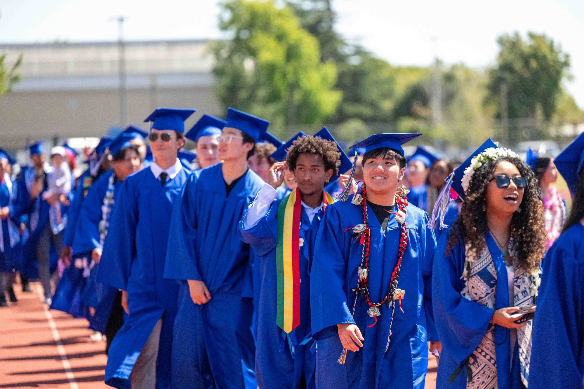 College of Alameda Class of 2026 gather in the COA stadium
